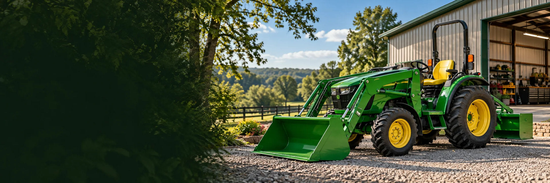 Green tractor outside a farm workshop